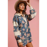 Babe Beachwear contrast collar summer romper with floral print and long sleeves on model