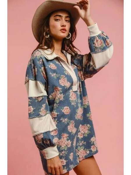 Babe Beachwear contrast collar summer romper with floral print and long sleeves on model