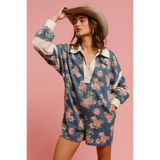 Babe Beachwear contrast collar summer romper with floral print and long sleeves styled with wide-brim hat