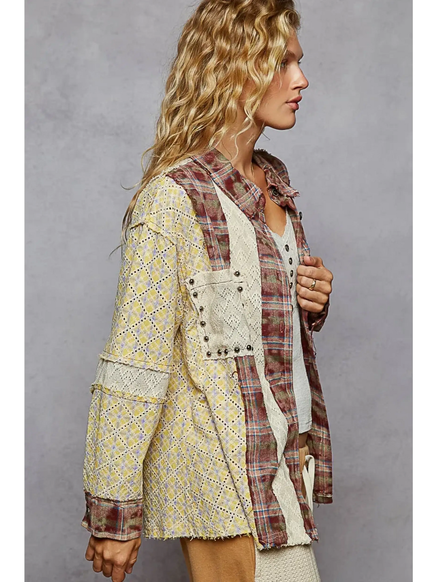 Trendsi contrast plaid long sleeve top with mixed yellow and red plaid patterns on a female model
