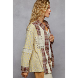 Trendsi contrast plaid long sleeve top with mixed yellow and red plaid patterns on a female model