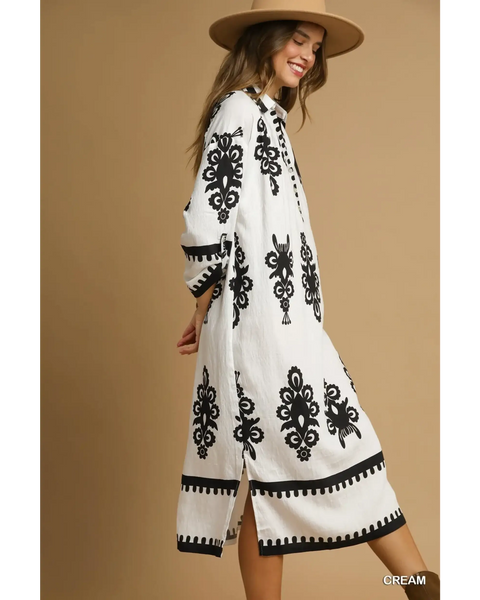 Trendsi long sleeve resort tunic dress in white with black embroidery midi length and side slits