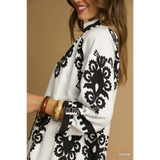 Trendsi cream long sleeve resort tunic dress with black floral print and buttoned cuffs