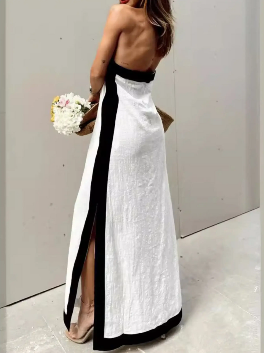 Back view of crisscross maxi dress for women by Trendsi in white with black trim and open back design
