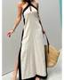 Trendsi crisscross maxi dress for women in beige with black trim and side slits styled with a straw tote