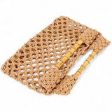 Artini Accessories crochet bamboo handle clutch with open weave design and bamboo handles