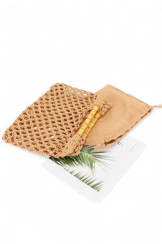 Artini Accessories crochet bamboo handle clutch in natural color with a protective beige pouch