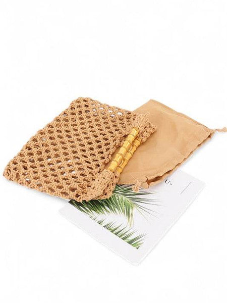 Artini Accessories crochet bamboo handle clutch in natural color with a protective beige pouch