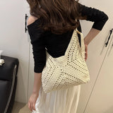 Babe Beachwaer Crochet Summer Shoulder bag in cream worn by woman with black top and white skirt