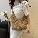 Babe Beachwaer Crochet Summer Shoulder bag in brown worn by woman with white outfit holding flowers