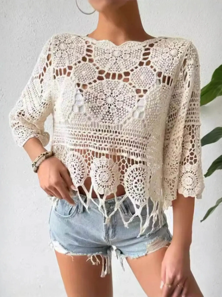 Trendsi cotton crochet fringe top in white with circular patterns and tassels worn with denim shorts