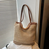 Trendsi crochet tote bag with leather handles in beige and brown hanging near window blinds
