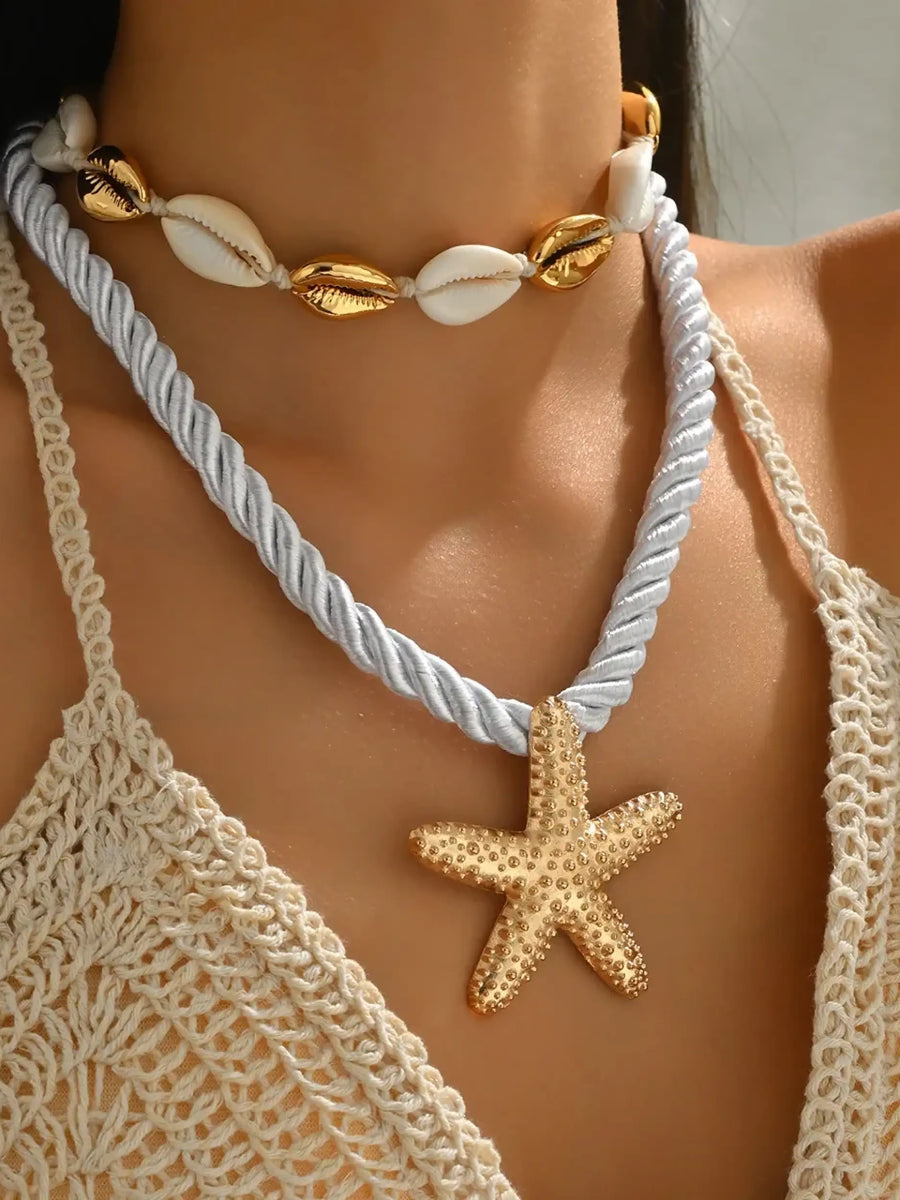 Trendsi cruise wear beaded rope necklace with gold starfish pendant and seashell choker on model