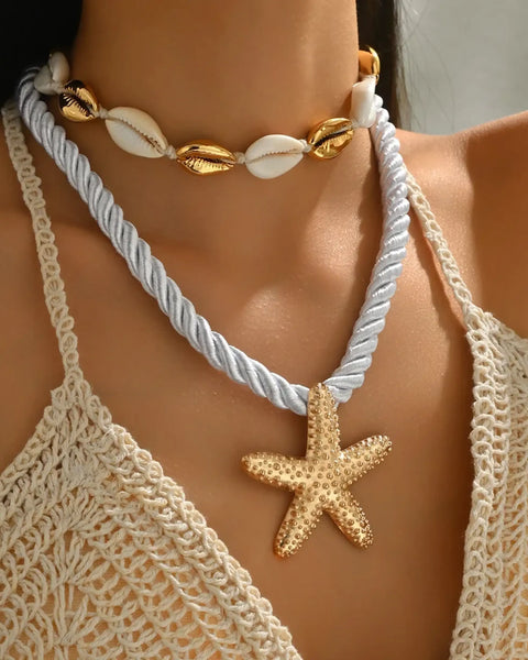 Trendsi cruise wear beaded rope necklace with gold starfish pendant and seashell choker on model