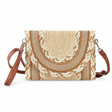 Babe Beachwear cruise wear must have straw clutch with woven design and brown leather strap