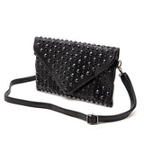 Artini Accessories black cruise wear studded handbag with adjustable strap and envelope flap