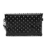 Artini Accessories black cruise wear studded handbag with round studs and detachable strap