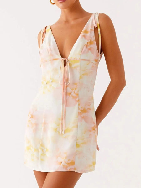 Babe Beachwear mini dress with pastel floral print and tie front detail, perfect cute beach dresses for petites
