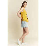 Trendsi cute emoji knit tank for beach in yellow with fringe hem worn with light denim shorts and white sneakers