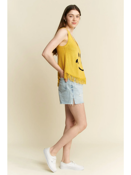Trendsi cute emoji knit tank for beach in yellow with fringe hem worn with light denim shorts and white sneakers