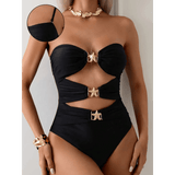 Beach Babes black cutout one piece swimsuit with gold buckle details and strapless design