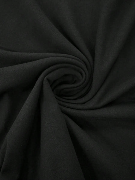 Close-up of black fabric swirl for Trendsi mini dress showcasing soft and smooth material texture