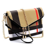 Designer Burnbury Envelope Clutch by Babe Beachwear with beige and black plaid pattern and gold chain strap