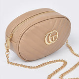 Babe Beachwear Designer Style Logo Belt Bag in beige with gold chain strap and quilted design