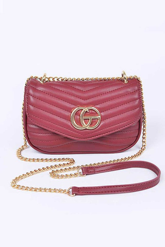 Artini Accessories designer style quilted chain bag in burgundy with gold chain strap and logo detail