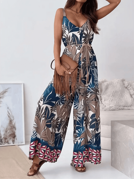 Trendsi Earth Toned Tropical Jumpsuit with sleeveless design and wide leg pants featuring leafy print