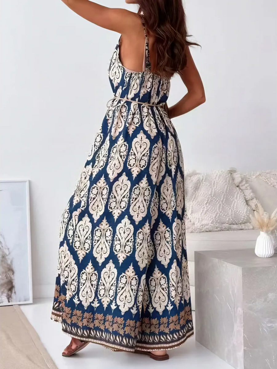 Trendsi Earth Toned Tropical Jumpsuit with sleeveless design and intricate blue and beige pattern