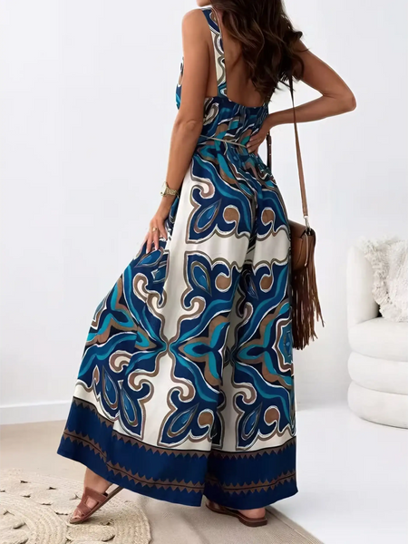 Trendsi Earth Toned Tropical Jumpsuit featuring wide-leg pants and a bold blue and brown pattern