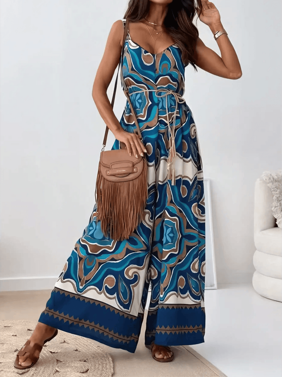 Trendsi Earth Toned Tropical Jumpsuit with blue and brown pattern, sleeveless design, and wide-leg fit