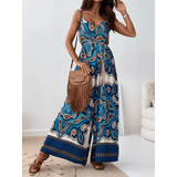 Trendsi Earth Toned Tropical Jumpsuit with blue and brown pattern, sleeveless design, and wide-leg fit