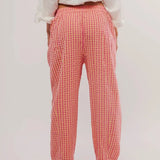 Trendsi pink elastic waist beach pants with a relaxed fit shown from the back