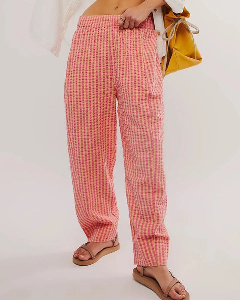Trendsi pink checkered elastic waist beach pants worn with sandals for casual summer look