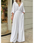 Elegant wide-leg beachwear jumpsuit by Babe Beachwaer in white with a deep V-neck and flowing sleeves