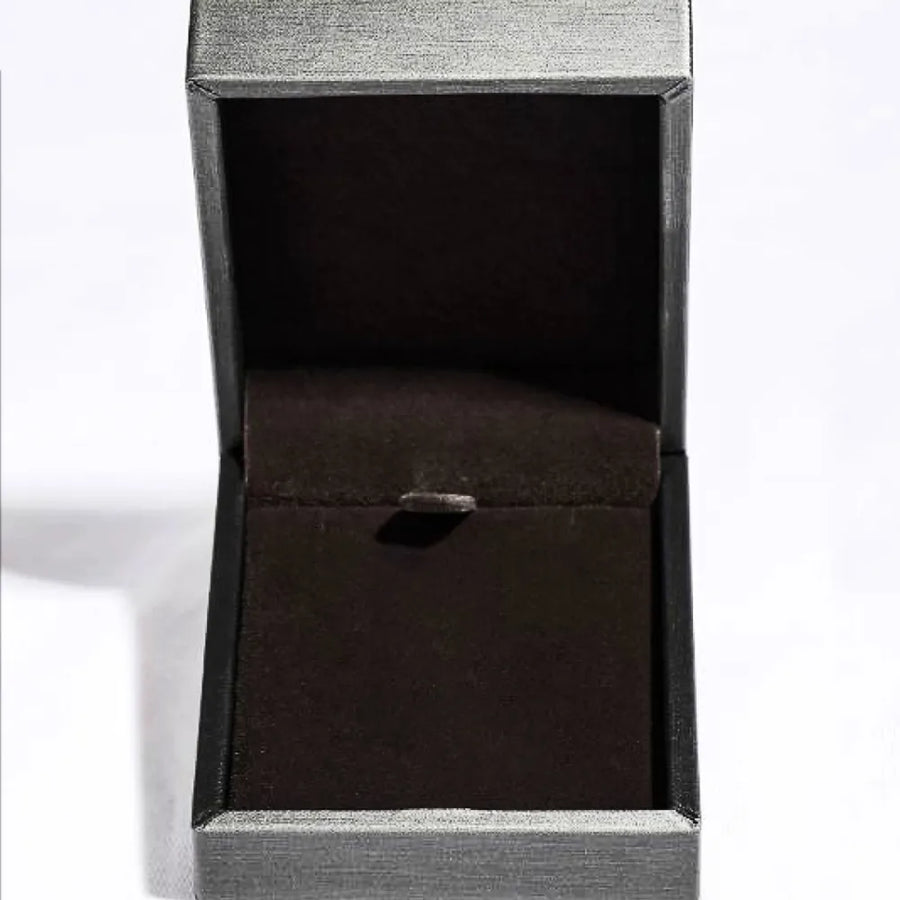 Empty gray jewelry box with black velvet interior for 1.3 carat drop necklace display