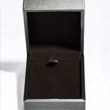 Empty gray jewelry box with black velvet interior for 1.3 carat drop necklace display