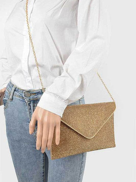 Babe Beachwear Evening Clutch Rhinestones gold envelope bag with chain strap worn on model