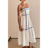 Side view of white contrast trim midi dress with blue piping and spaghetti straps