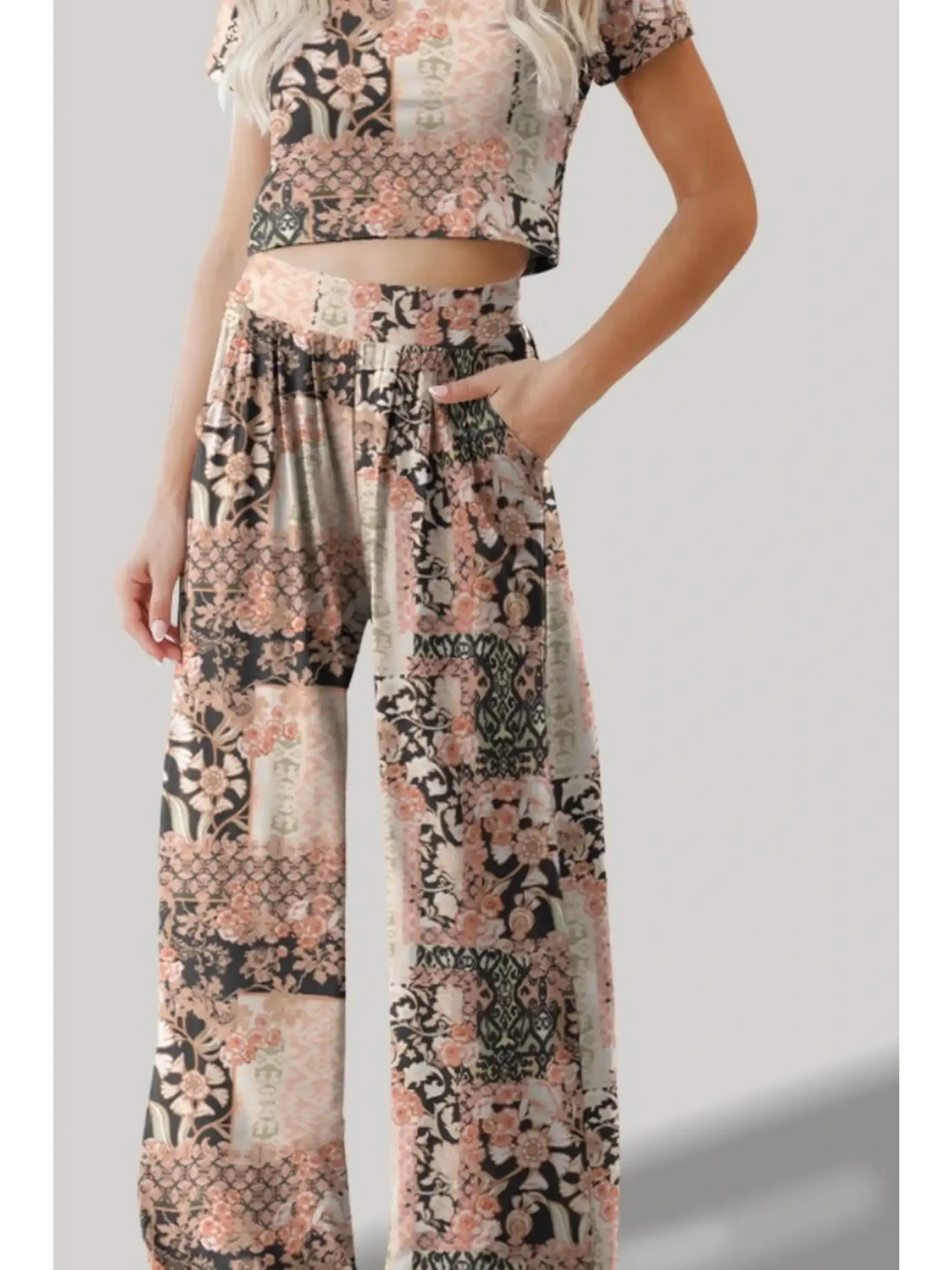 Trendsi floral patterned pants set with a crop top featuring a relaxed fit and pockets