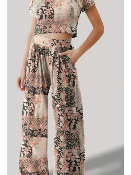 Trendsi floral patterned pants set with a crop top featuring a relaxed fit and pockets