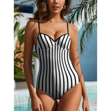 Beach Babes figure flattering black and white swimsuit with vertical stripes and thin straps1