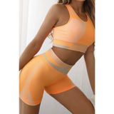 Babe Beachwaer color block sports bra and shorts set in orange and beige for activewear