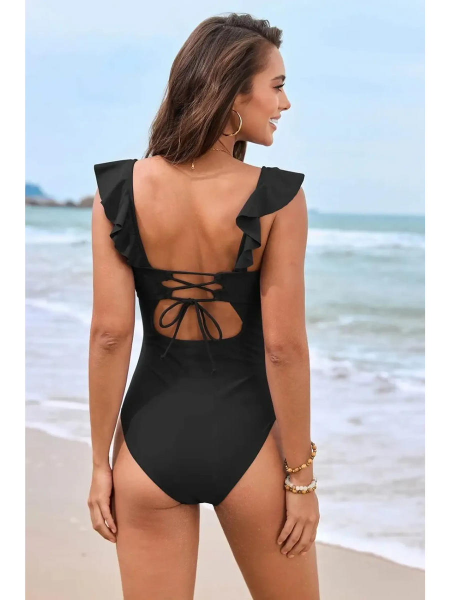Babe Beachwear flattering one piece swimwear in black with ruffle straps and lace-up back design