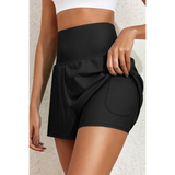 Beach Babes black swim shorts showing flattering swimsuit bottoms with pockets and high waist design