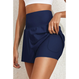 Beach Babes navy swim shorts showing flattering swimsuit bottoms with pockets and high waist design