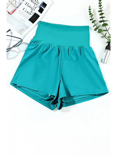 Beach Babes turquoise swim shorts flattering swimsuit bottoms with pockets and high waist design