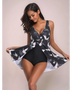 Beach Babes black full coverage skirt swimsuit with white crane print and V-neck design